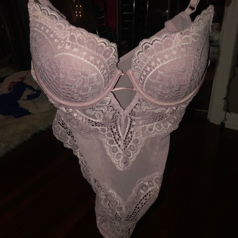 Brand new pink lingerie body suit